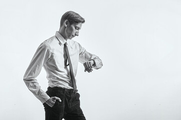 Office man looking at watch is sad and depressed
