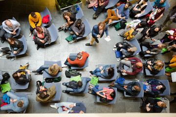 High angle view of people attending conference