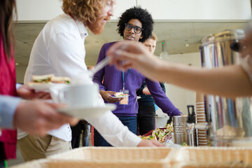 People drinking coffee during conference break