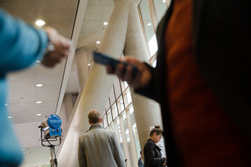 Businessmen talking during conference break