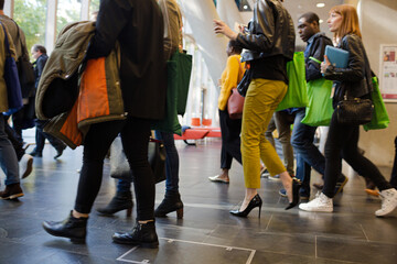 People leaving conference hall