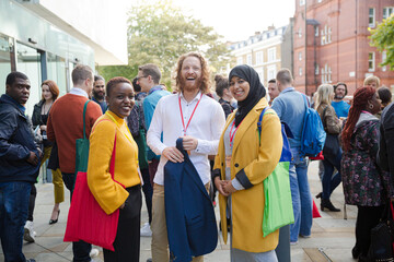 Portrait of smiling conference speakers