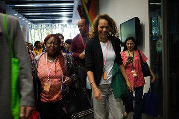 People arriving at conference hall