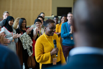 Fototapeta premium Female speaker talking to audience