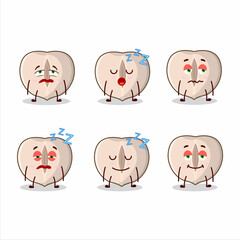 Cartoon character of slice hazelnut with sleepy expression