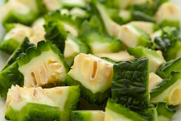 Extreme Close-Up of Organic Indian bitter gourds (Momordica charantia) or fresh Green Karela,...
