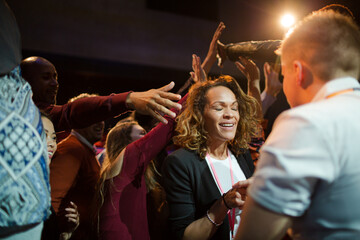 Obraz premium Speakers talking with audience