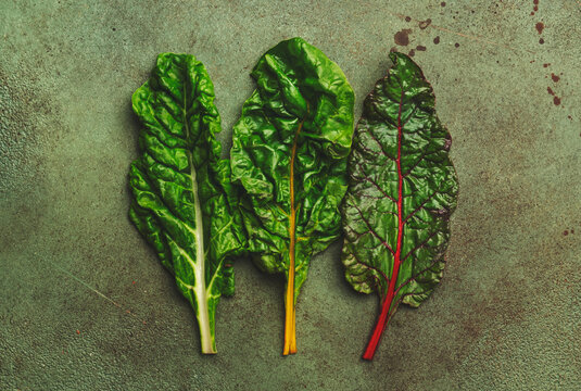 Rainbow Swiss Chard Leaves On Rusty Background Raw Green Leaf Vegetables Top View Copy Space Stock Photo Adobe Stock