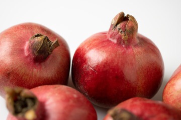 Pomegranate On White Background Close Up