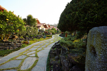 manicured garden landscape and house