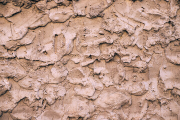 Beige cement texture wall background. Close up.