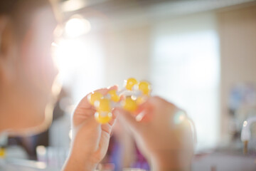 Curious girl student examining molecular structure
