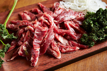 raw beef on a cutting board 