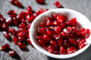 pomegranate seeds in a bowl