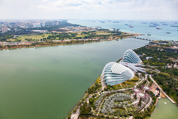 SINGAPORE, SINGAPORE - MARCH 2019: aerial view of Singapore City skyline with Gardens by the Bay