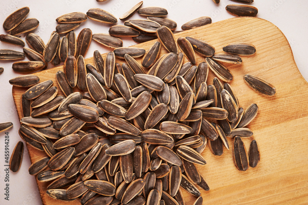 Sticker sunflower seeds on a cutting board