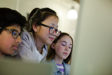 Students using computer at desk