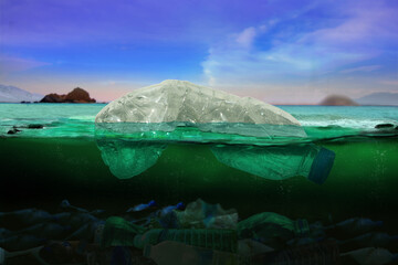 Plastic bottle, pollution that floats in the ocean (Environment concept)	