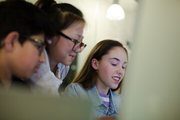Students using computer at desk