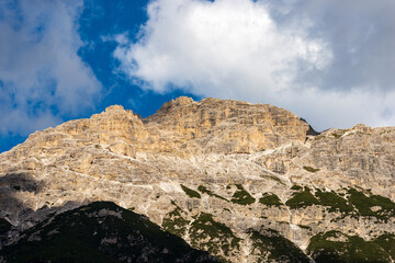 Fototapeta na wymiar Mountain peak of Monte Rudo or Rautkofel, 2865 m., south face, seen from the lake of Landro or Durrensee (Lago di Landro), Dolomites, UNESCO world heritage site, Trentino-Alto Adige, Italy, Europe.