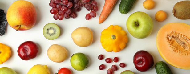 Set of different vegetables and fruits on white background