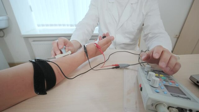 Patient nerves testing using electromyography at medical center