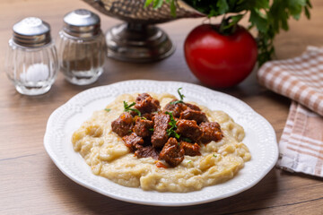 Turkish Food Hunkar Begendi made with Eggplant and Meat.
