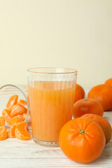 Mandarin jam and ingredients on white wooden table