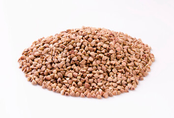 Pile of buckwheat isolated on white background.