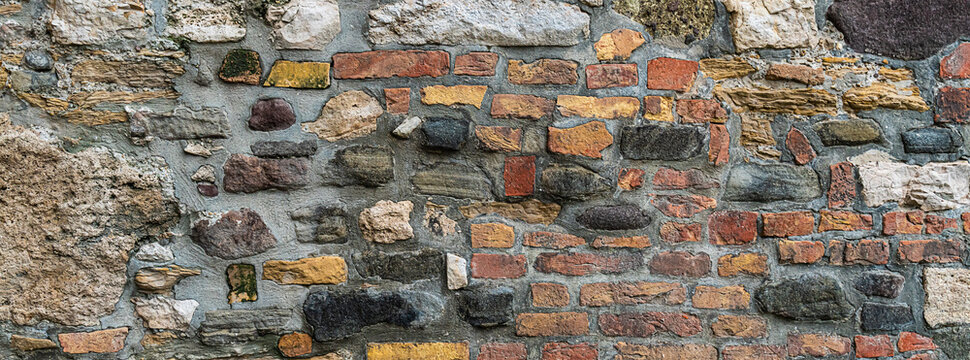 stone wall of an old brick factory old and weathered background © Kai Beercrafter