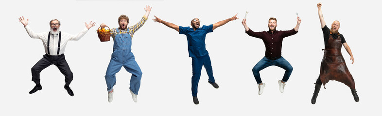 Collage of happy men, professor, farmer, doctor, smith and architector jumping isolated on white studio background. Horizontal flyer, collage