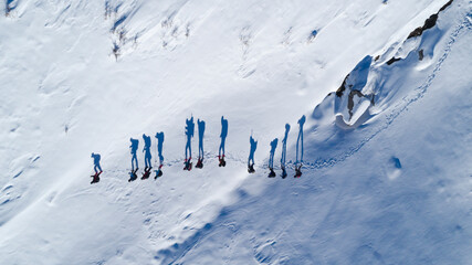 bird's eye view of mountaineer's hiking photos and spectacular snowy mountain landscapes