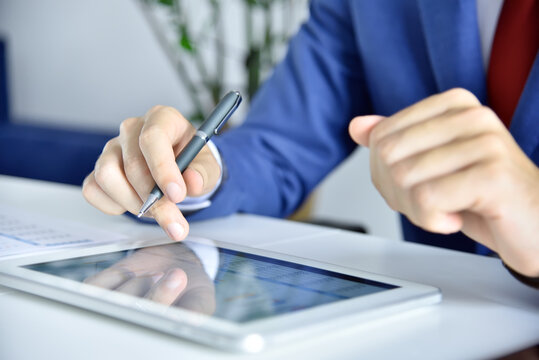 Accountant man checks business report