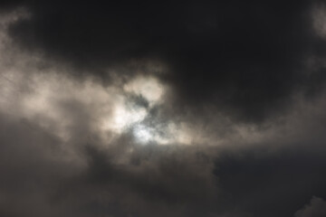 Obraz premium Dark grey storm clouds background. View of Rain clouds in sky.