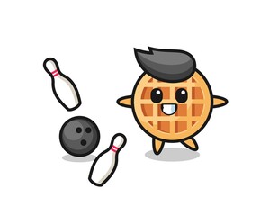 Obraz premium Character cartoon of circle waffle is playing bowling