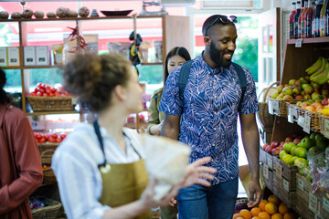 People shopping in grocery store