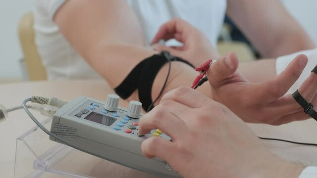 Patient nerves testing using electromyography at medical center