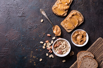 Tasty sandwiches with peanut paste and honey for breakfast