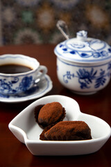 delicious dates dipped in chocolate covered with cacao 