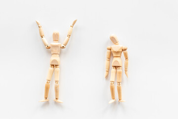 Mental and emotional gender difference between man and woman. Two wooden mannequin figurine connection