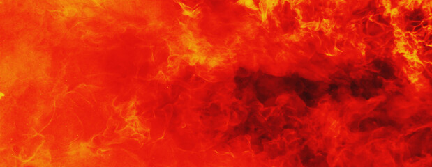 Obraz na płótnie Canvas Background of fire as a symbol of hell and eternal torment. Horizontal image for text or design.