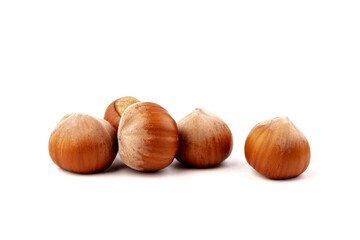 Group of hazelnuts, isolated on white background