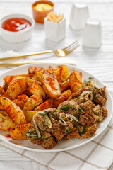 Grilled Pork Shoulder Steaks with potato wedges