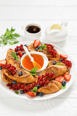 crispy sweet toasts with fresh berries and honey