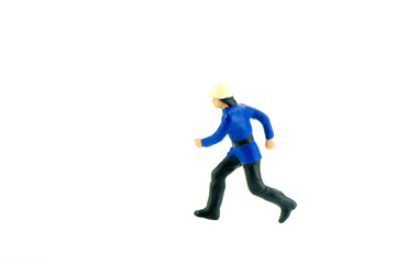 Miniature people engineer worker construction concept on white background with a space for text