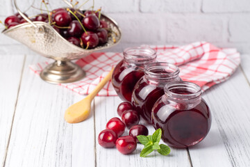 Jars with freshly homemade cherry jam