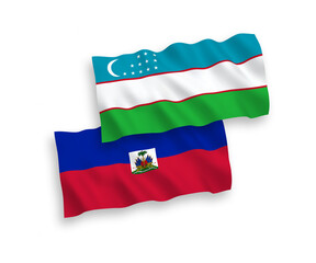 Flags of Republic of Haiti and Uzbekistan on a white background