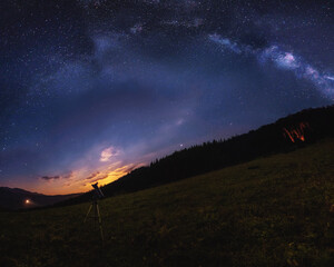 sunrise in the Almaty mountains. Night star. Galaxy