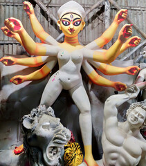 Clay Idol of goddess durga in a clay idol workshop at Kolkata. Selective focus on subject.