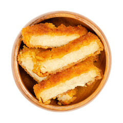 Deep-fried vegan schnitzel slices, in a wooden bowl. Fried cutlets, based on soy protein, a meat substitute, with crispy breading, cut into slices, ready to eat. Close-up from above, macro food photo.